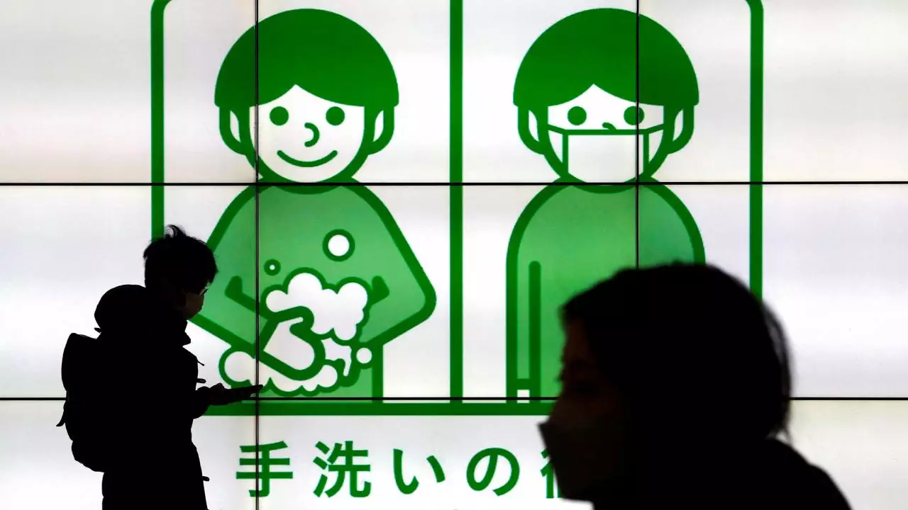 Yaponiya COVİD-19-u mövsümi qrip kimi təsnif edib