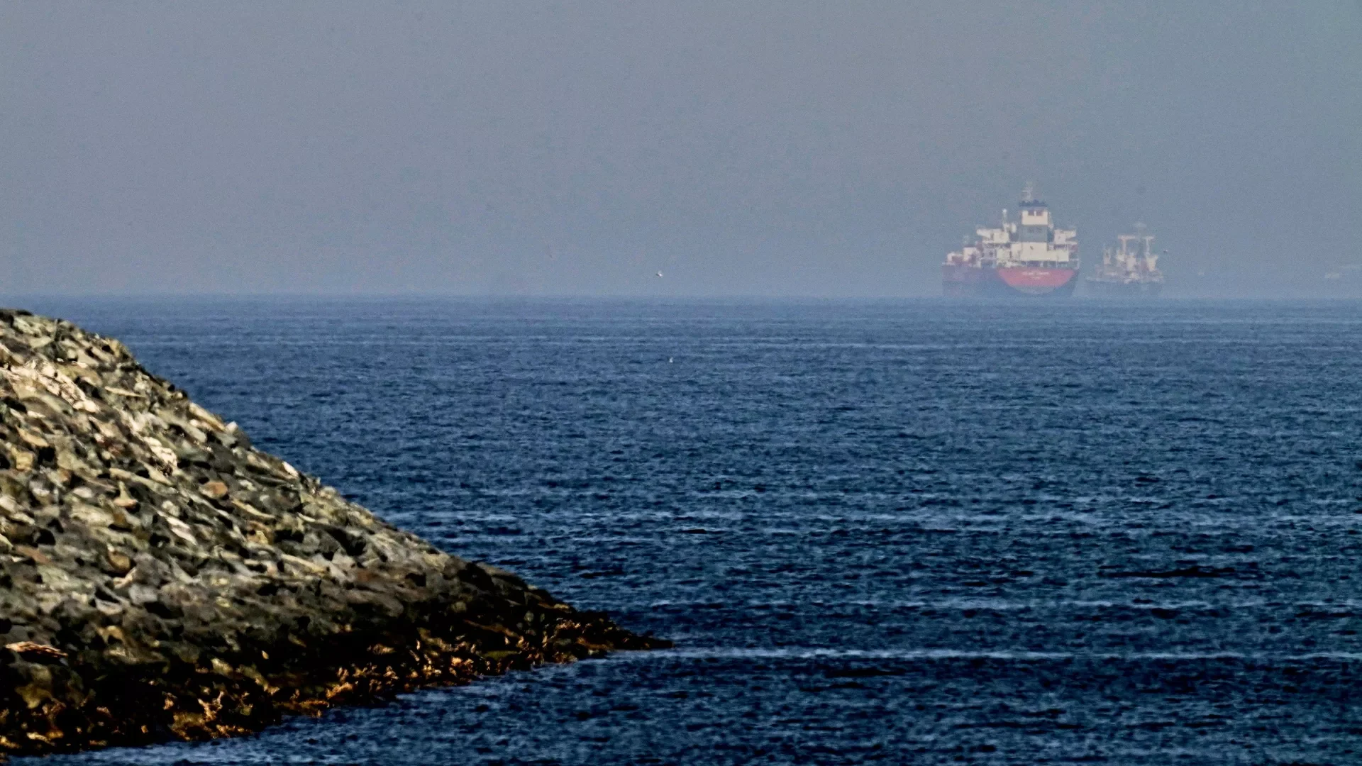 Commercial vessel hit and catches fire in Strait of Hormuz
