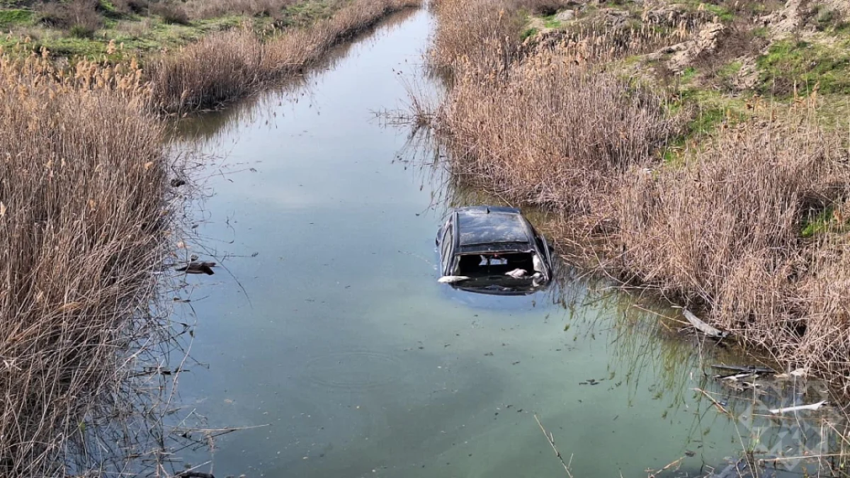 Two killed as car plunges into canal in Zardab
